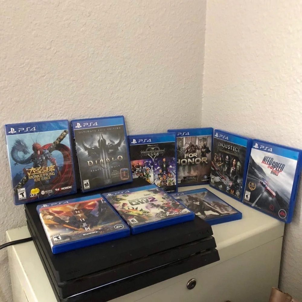 PS4 PlayStation 4 Pro CUH-7115B 1TB + 9 Games + Power Cord Bundle